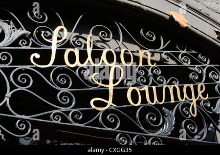 Wrought iron ' Saloon Lounge ' sign outside a UK pub Stock Photo