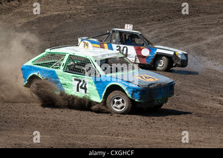 Race for survival. Two cars on the track Stock Photo