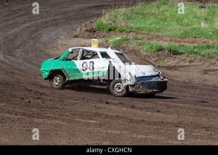 Race for survival. Broken car on the track Stock Photo