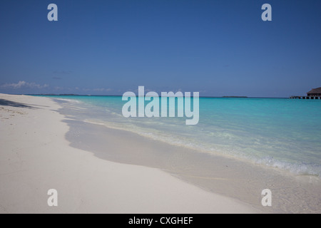 White sand beach, clear blue water - Maldives Stock Photo