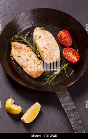 Firsh steaks fried with fresh herbs Stock Photo