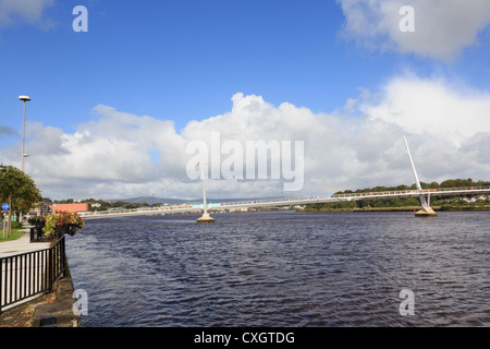 Peace bridge over River Foyle from cityside on west to Waterside on east of Derry city Co Londonderry Northern Ireland UK Stock Photo