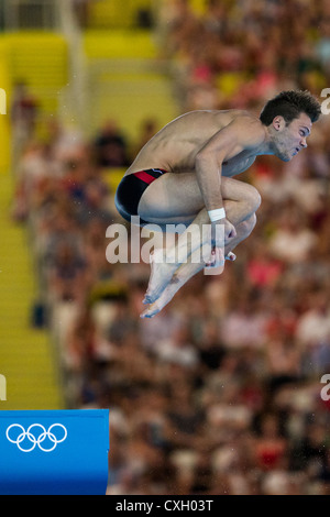 Riley Mccormick (CAN) competing in 10m platform diving at the Olympic ...