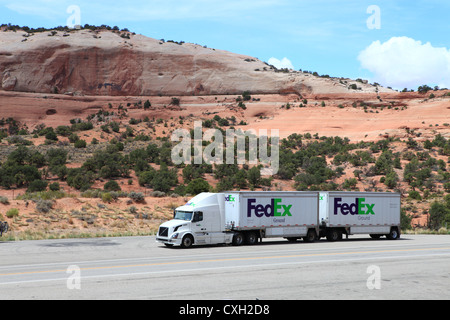 Fedex truck on highway in Moab, Utah, US