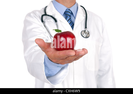 Doctor holding apple Stock Photo