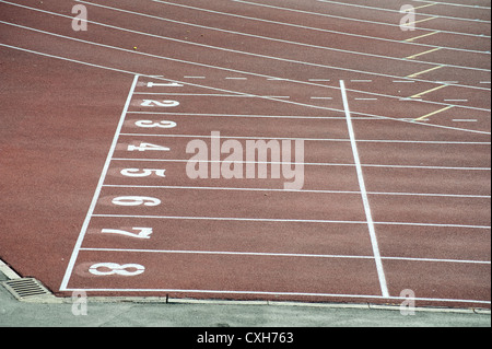 Starting grid with numbers and lanes on athletic track Stock Photo