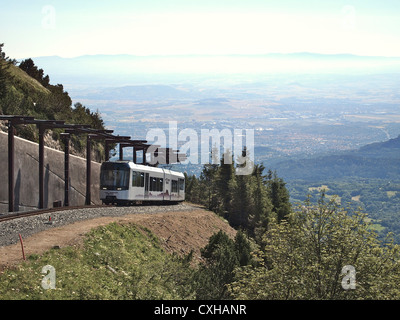 Tourist train going to the top of the Puy de Dome volcano in the Park Regional of Auvergne volcanoes, France Stock Photo