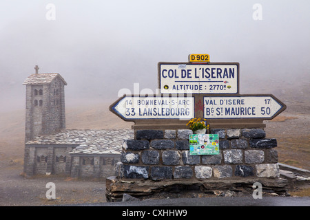 Altitude sign and chapel at the top of the Col de L'Iseran, Savoie, France. Stock Photo