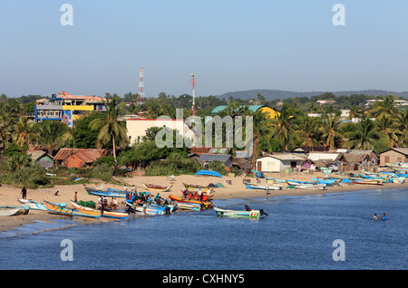 Fishing boats unloading their catch on Back Bay beach in Trincomalee, Sri Lanka. Stock Photo