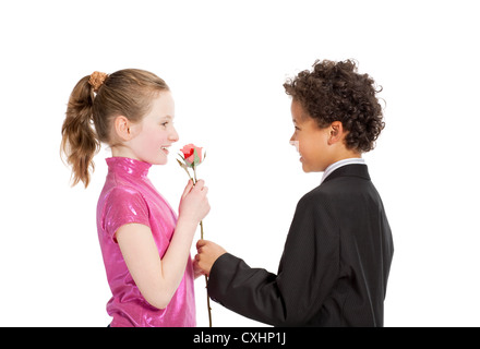 boy giving a rose to a girl Stock Photo