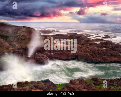 Cook's Chasam with breaking waves and sunset. Oregon Stock Photo
