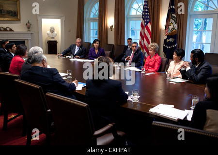 US President Barack Obama meets with members of the Congressional Asian Pacific American Caucus September 23, 2011 in the Cabinet Room of the White House. Stock Photo