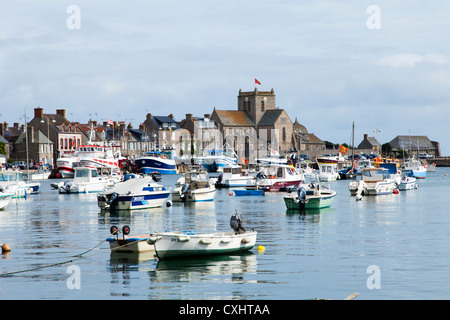 Barfleur harbour and town across the sea, Normandy, France Stock Photo