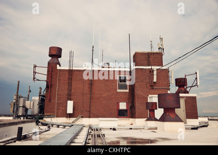 Cellular antennas installed on the top of the roof Stock Photo