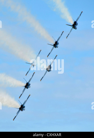 The Navy Blue Angels perform acrobatics during the 2012 Kaneohe Bay Airshow September 30, 2012 in Kaneohe Bay, Hawaii. The show at Marine Corps Base Hawaii celebrated the 100th Anniversary of Marine Corps Aviation. Stock Photo