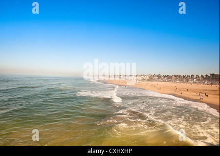 Huntington Beach, California in the morning shows the tides changing during a sunny weekend. Stock Photo