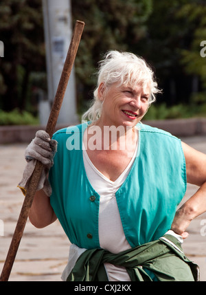 Maintenance worker in public park in Zaporozhye, Ukraine. Stock Photo