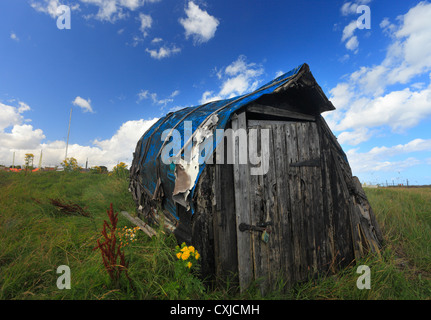 Upturned boat now used as a shed on Lindisfarne, Holy Island. Stock Photo