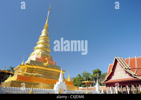 Wat Phra That Chae Haeng stay on top of a hill with a view of Nan and the valley, north Thailand. Stock Photo