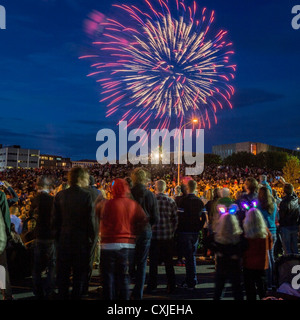 Crowd watching fireworks during Reykjavik’s cultural festival  known as Menningarnott. Reykjavik, Iceland Stock Photo