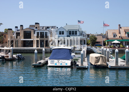 Waterfront mansions and pleasure boats on Balboa Island, California Stock Photo