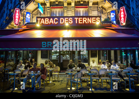 Sat outside Tabac Des Ternes , Brasserie in Paris France Stock Photo