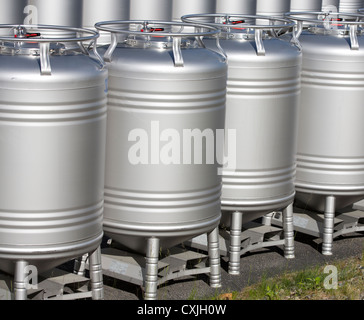 Industrial stainless steel containers used in dairy product production line , Finland Stock Photo