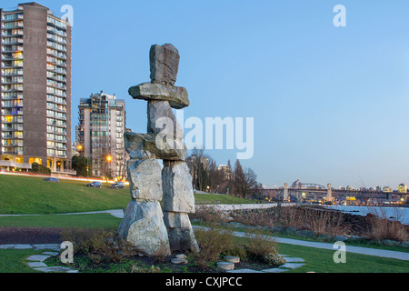 Inukshuk Stone Sculpture on Sunset Beach Alond English Bay in Vancouver BC Canada Stock Photo