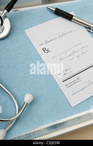 Stethoscope, Pen and Prescription on Medical Tray, Birmingham, Alabama, USA Stock Photo