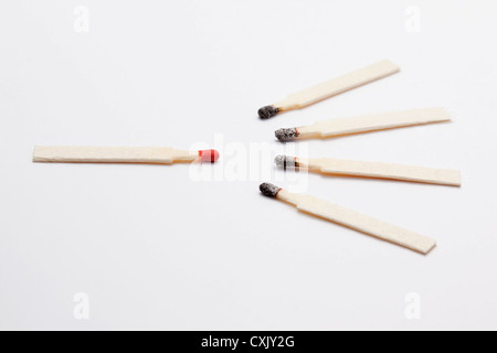 Unused Match with Burnt Matches Stock Photo