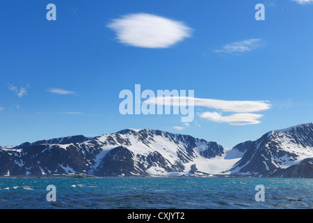 Glacier and Mountains, Magdalenefjorden, Spitsbergen, Svalbard, Norway Stock Photo