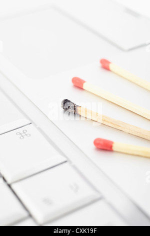 Matches on Laptop Stock Photo