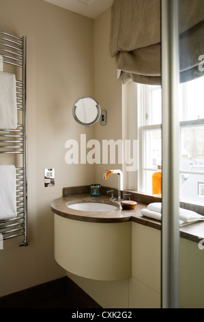 colour interior bathroom towel window treatment window blinds towel rack marble beige brown shaving mirror tap fitting plug Stock Photo