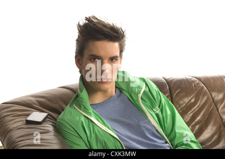 young man with green jacket Stock Photo