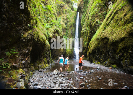 People Hiking in Oneonta Gorge, Oregon, USA Stock Photo