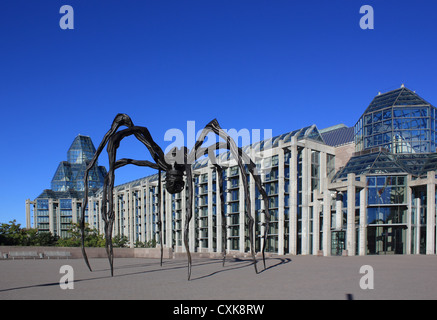 'Maman' a giant spider sculpture created by Louise Bourgeois dwarfs the National Art Gallery of Canada in Ottawa, Ontario. Stock Photo