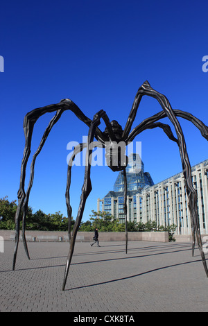 'Maman' a giant spider sculpture created by Louise Bourgeois dwarfs the National Art Gallery of Canada in Ottawa, Ontario. Stock Photo