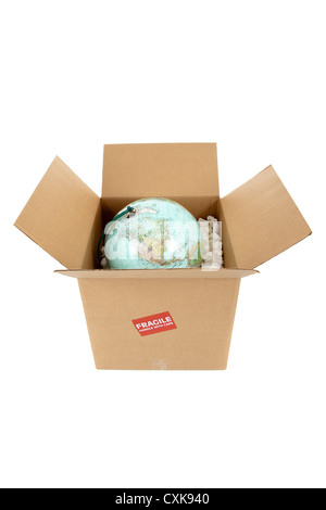Globe in a packing box with a fragile sticker on a white background Stock Photo