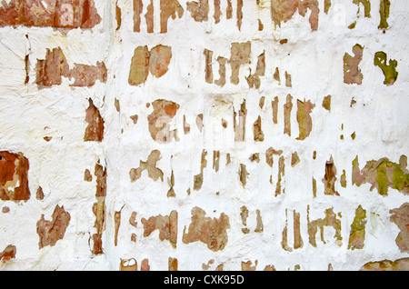 white painted and aged brick old wall background Stock Photo