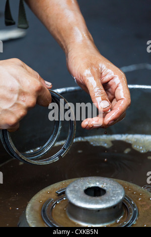 Hand of a Mechanic in Bangkok Stock Photo