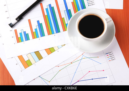 Businessman's workplace with documents and cup of coffee Stock Photo