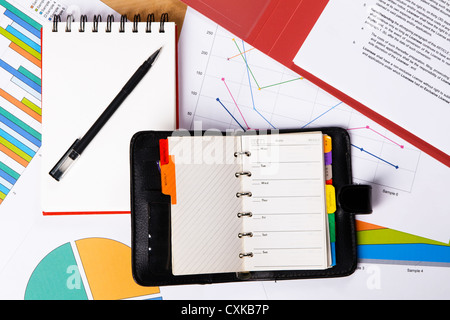 Businessman's workplace with documents and cup of coffee Stock Photo