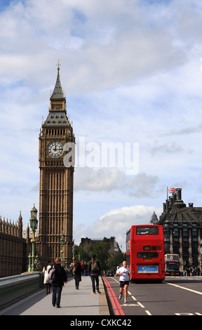 The rear of a London red double decker bus as it crosses Westminster Bridge, with Big Ben in the distance Stock Photo