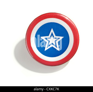 red white and blue lapel button photographed on a white background Stock Photo