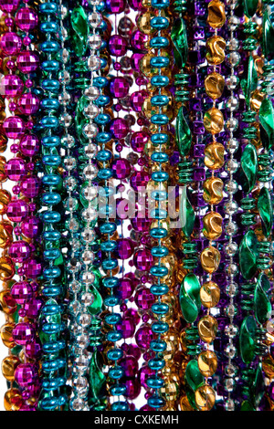 Background of multicolored Mardi gras beads Stock Photo