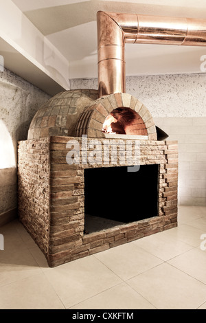 wood fired oven in a restaurant interior Stock Photo