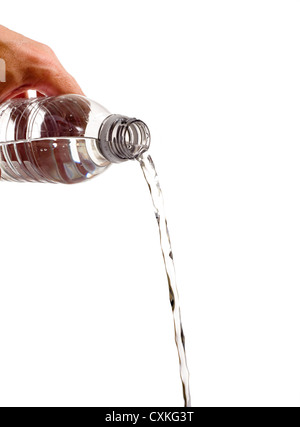 A bottle of water being poured out on a white background with copy space Stock Photo