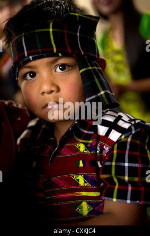 Mizoram, a state in Northeast India, is home to several tribes. This portrait showcases traditional tribal costumes. Stock Photo