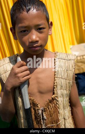 Mizoram, a state in Northeast India, is home to several tribes. This portrait showcases traditional tribal costumes. Stock Photo