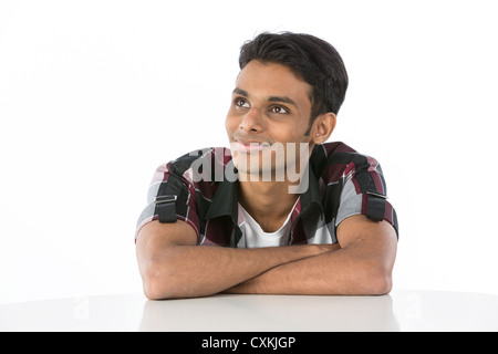 Happy Indian man looking up. Isolated on white background Stock Photo